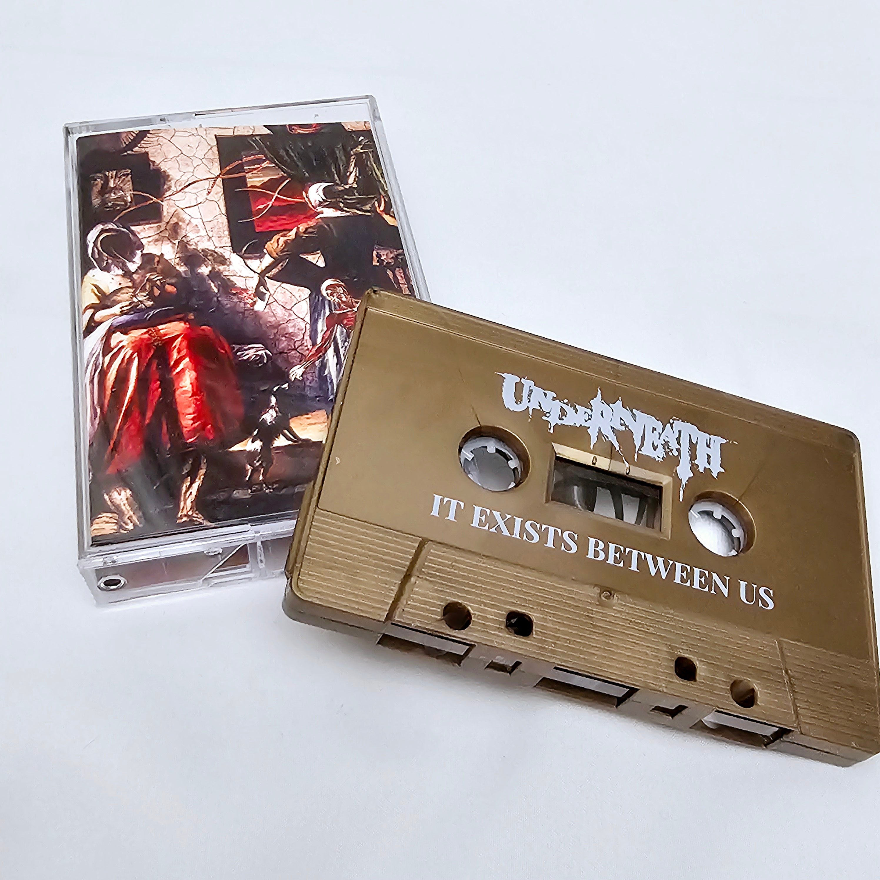 Underneath - 'It Exists Between Us' Cassette (Gold)
