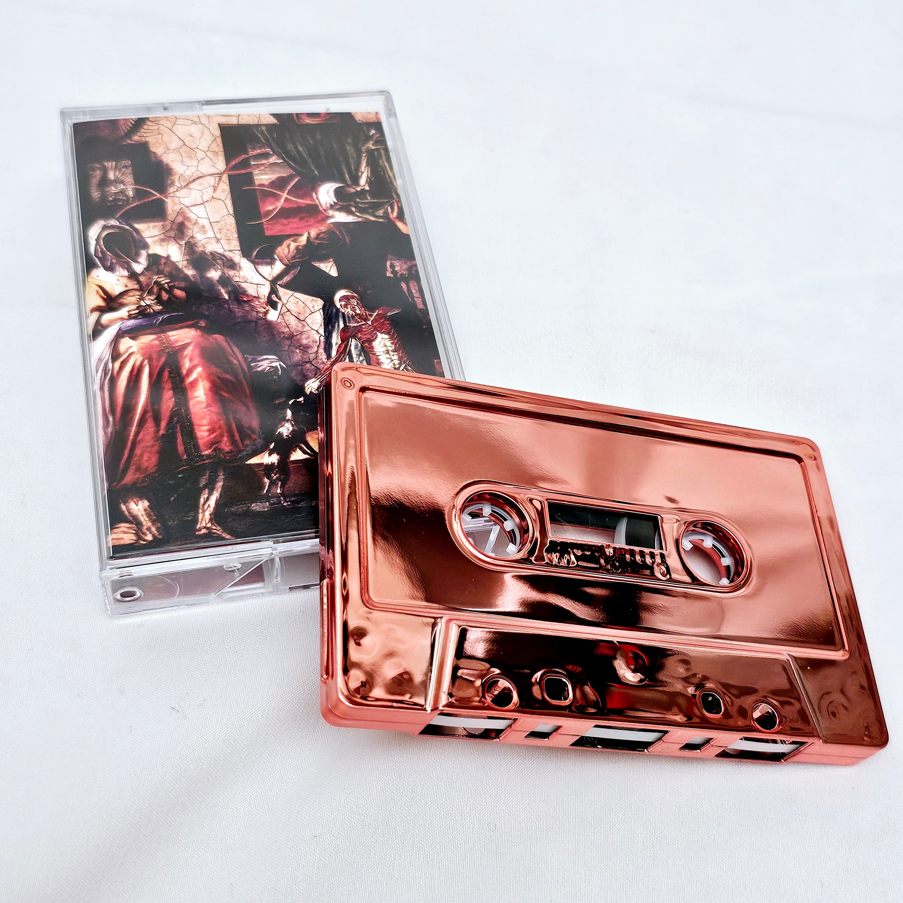 Underneath - 'It Exists Between Us' Cassette (Pink Metal Plated)